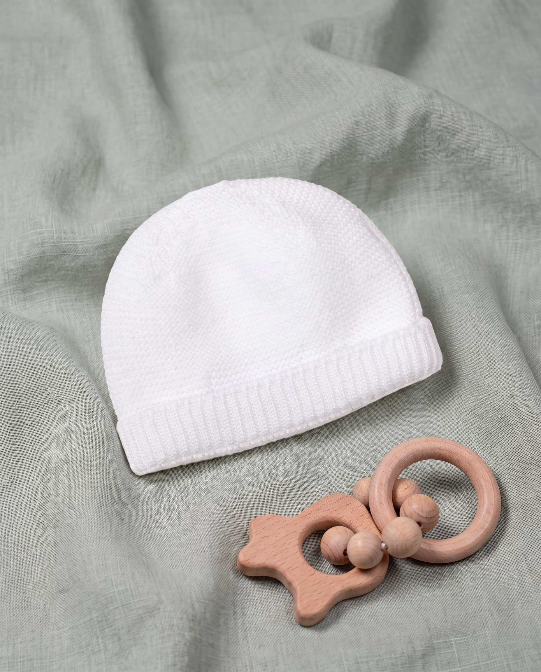 Bonnet bébé 100% laine en laine mérinos Cashwool, coloris blanc